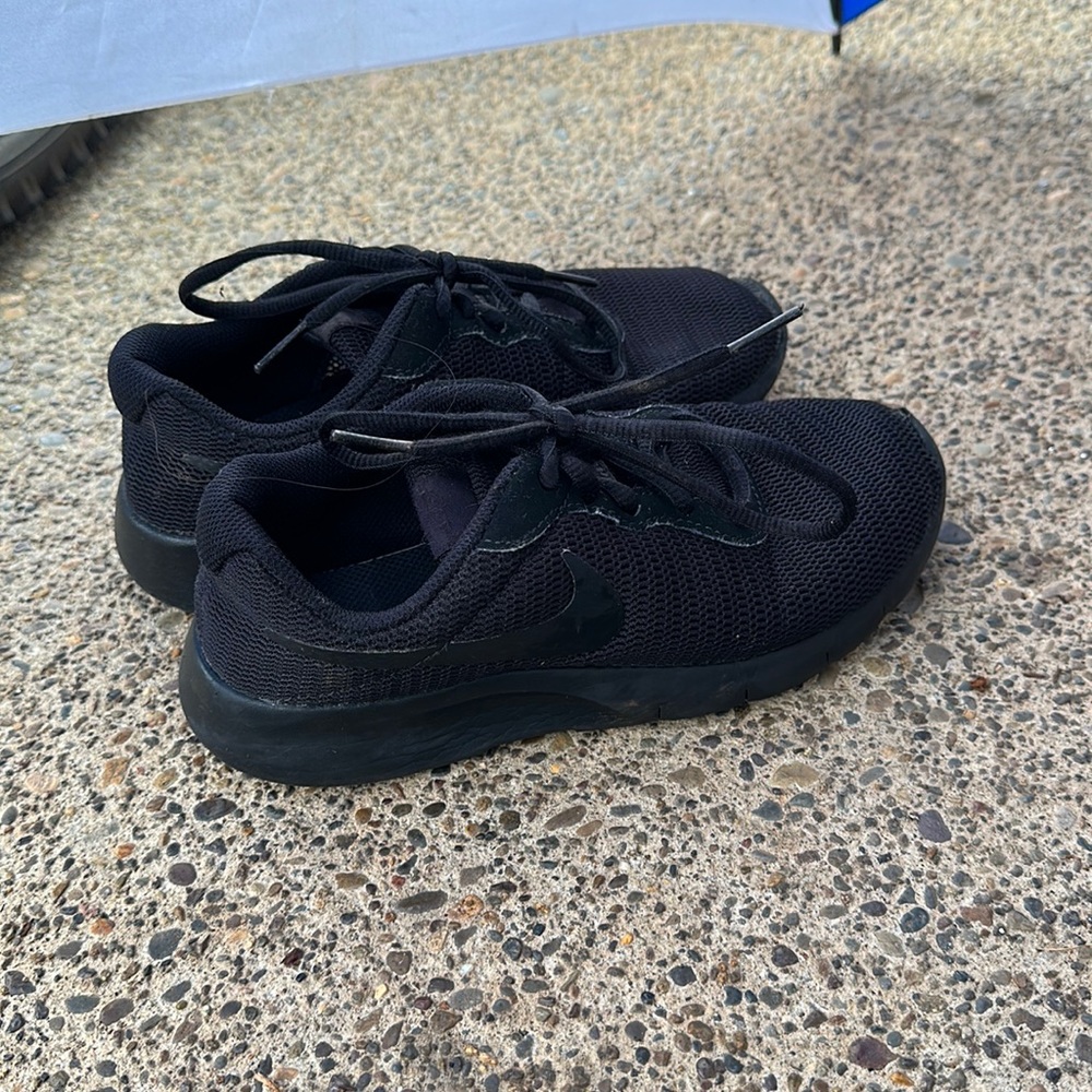 Kids black Nikes